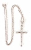 An 18ct white gold and diamond cross necklace, the cross set with five small round brilliant