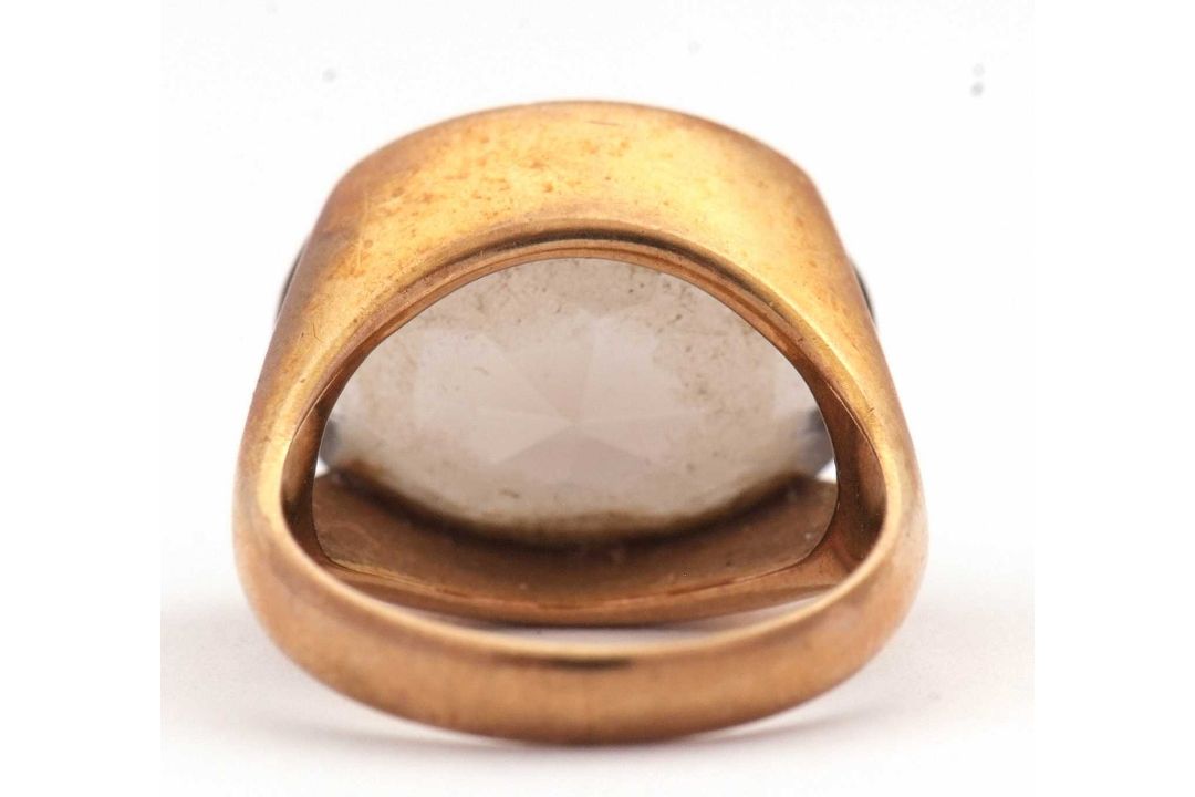 A 9ct smokey quartz ring, the oval smokey quartz in a horizontal tension settting, with split - Image 5 of 8