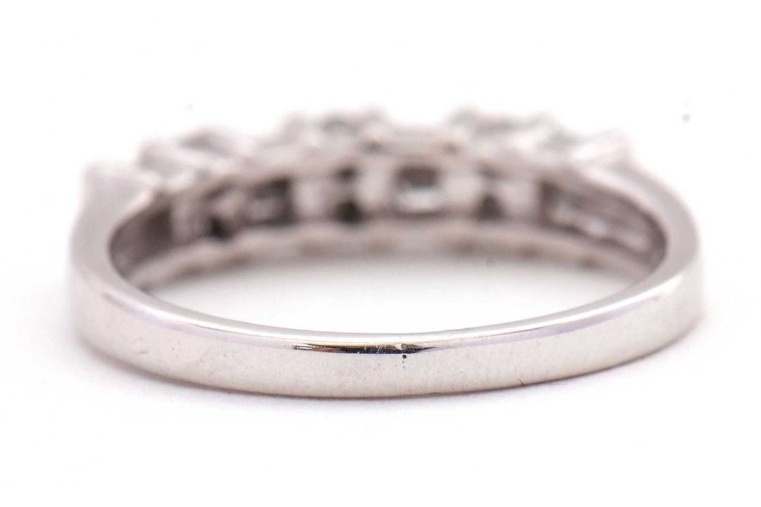 A 14K diamond ring, alternatively set with two baguette and two round brilliant cut diamonds, - Image 3 of 7