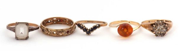 Five gemset rings: to include a 9ct sapphire wishbone ring stamped 375, size M, 1.3g; a 9ct white