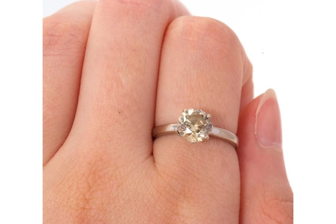 An 18ct champagne diamond solitaire ring, the round brilliant cut diamond, estimated approx. 1. - Image 6 of 9
