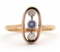 A sapphire and diamond ring, the oval frame with two collet mounted old mine cut diamonds and a