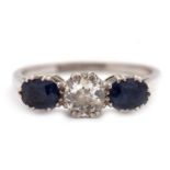 A three stone sapphire and diamond ring, the central old mine cut diamond, estimated approx. 0.