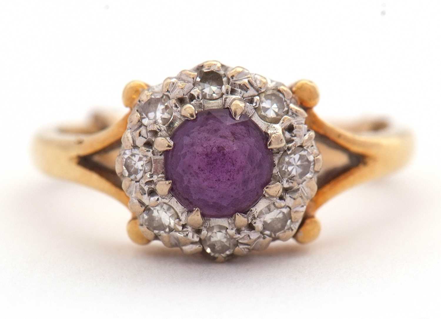 An 18ct amethyst and diamond ring, the central round amethyst surrounded by single cut diamonds, - Image 4 of 7