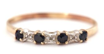 A sapphire and diamond ring, the alternating round sapphires interspaced with diamond hightlights,