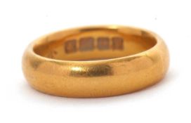 A 22ct gold wedding ring, hallmarked Birmingham 1918, size K, 8.5g