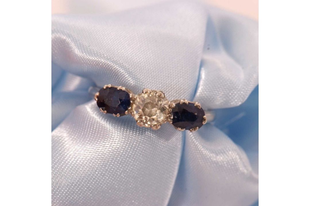 A three stone sapphire and diamond ring, the central old mine cut diamond, estimated approx. 0. - Image 9 of 9