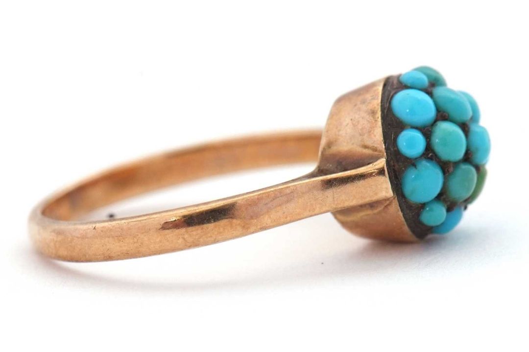 A turquoise cluster ring, the cluster composed of small turquoise cabochons, in raised mount with - Image 2 of 6