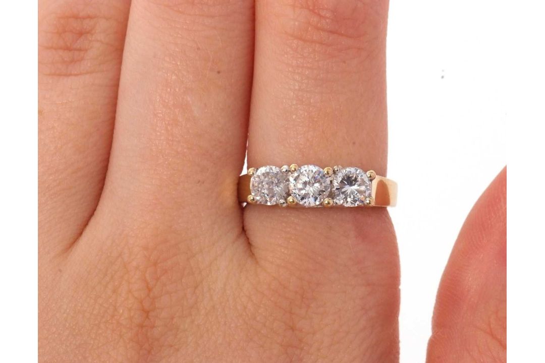 A 9ct CZ ring, the three round CZ's with tapering shoulders and plain band stamped 375 with - Image 7 of 8