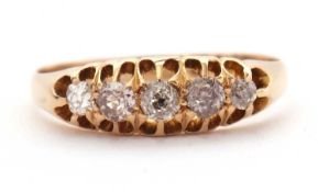 A late Victorian 18ct diamond ring, the five slightly graduated old mine cut diamonds, total