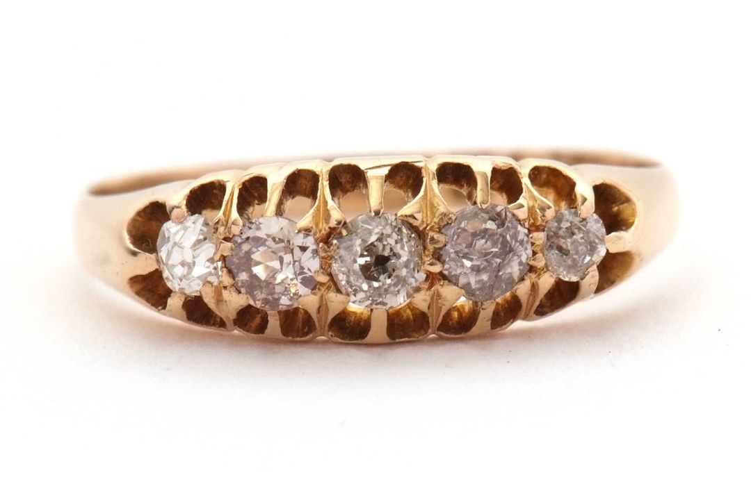 A late Victorian 18ct diamond ring, the five slightly graduated old mine cut diamonds, total - Image 1 of 7