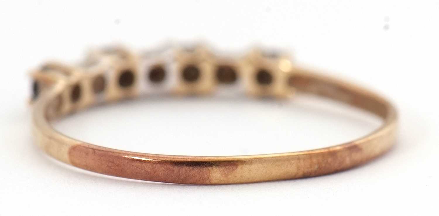 A sapphire and diamond ring, the alternating round sapphires interspaced with diamond hightlights, - Image 5 of 5