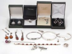 A mixed lot of jewellery: to include a silver and garnet necklace and matching earrings; three