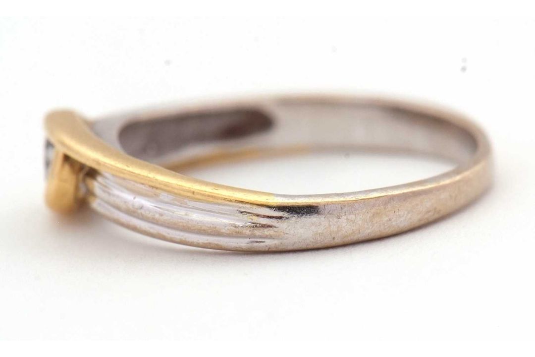 An 18ct bi-colour gold and diamond ring, the central round brilliant cut diamond, estimated - Image 6 of 6