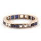 A blue and white stone eternity ring, the full hoop ring with channel set with blue and white - Image 1 of 3