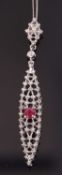 A 9ct ruby and diamond pendant necklace, the marquise shape pendant set to centre with a round ruby,