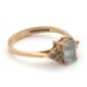 A 9ct aquamarine ring, set with an emerald cut aquamarine and three small round aquamarines to - Image 7 of 8