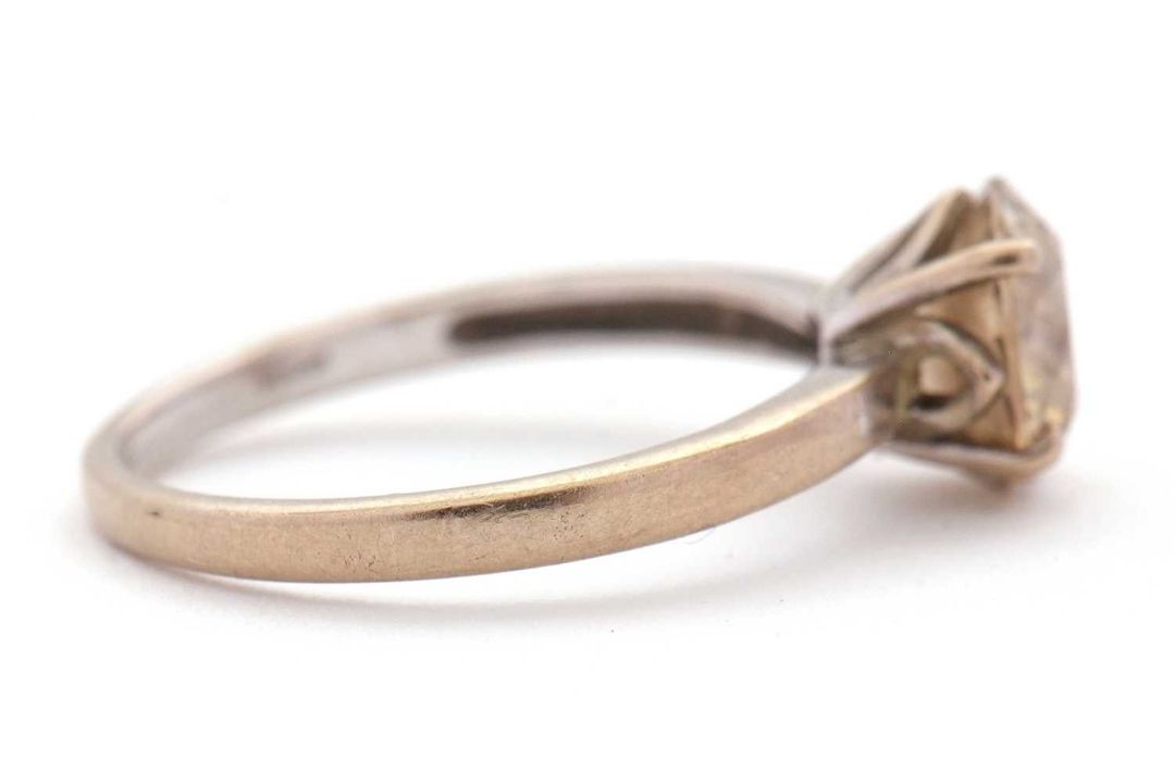 An 18ct champagne diamond solitaire ring, the round brilliant cut diamond, estimated approx. 1. - Image 2 of 9