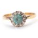 An 18ct blue zircon and diamond ring, the central round blue zircon surrounded by illusion set - Image 1 of 8