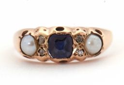 A 9ct gemset ring, the central blue stone with diamond highlights to either side and a cultured