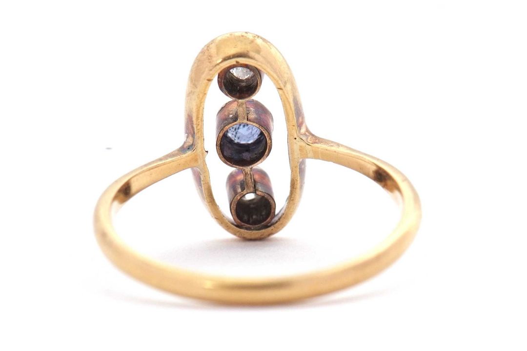 A sapphire and diamond ring, the oval frame with two collet mounted old mine cut diamonds and a - Image 3 of 7