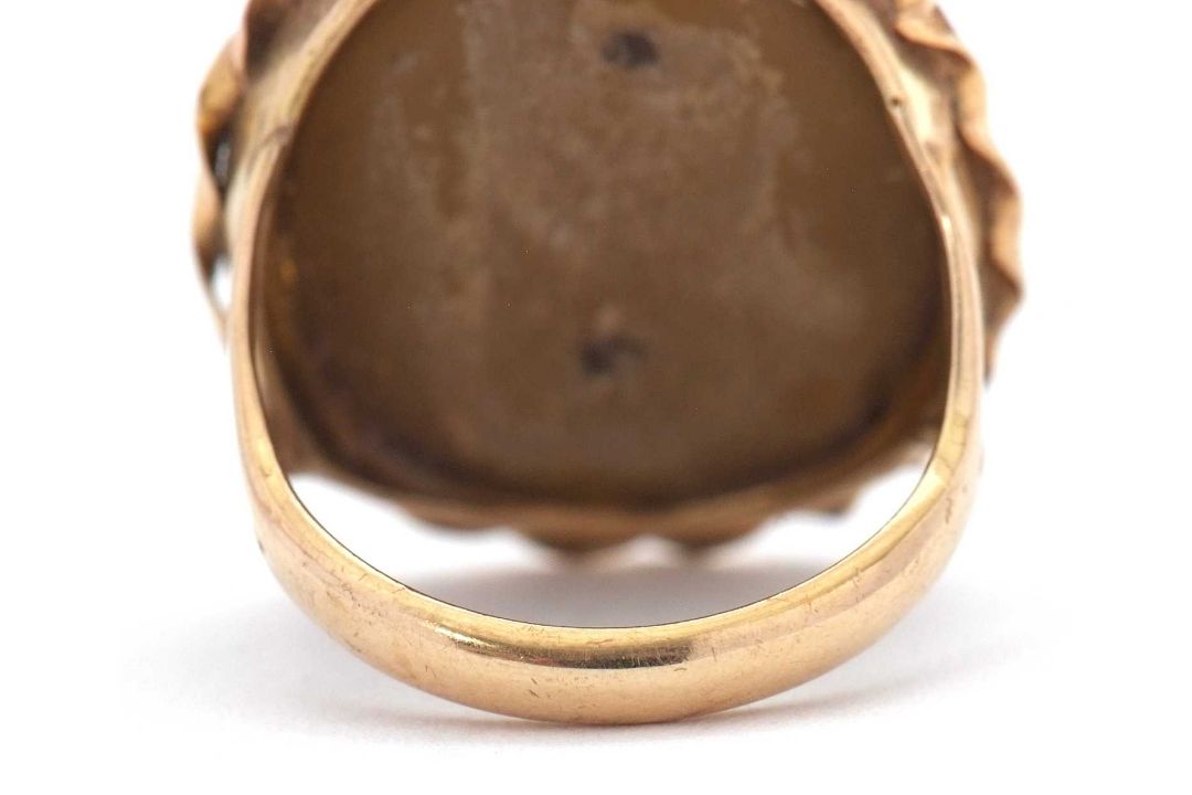 A lava cameo ring, the oval lava cameo carved with the head of a lady, claw mounted with rope - Image 2 of 5
