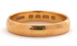 A 22ct wedding band, 4mm wide, hallmarked London 1929, size Q, 5.1g
