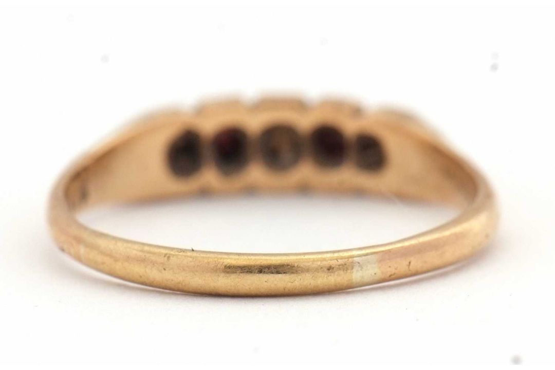 A ruby and diamond ring, set with old mine cut diamonds and mixed cut rubies, with plain band of - Image 7 of 7