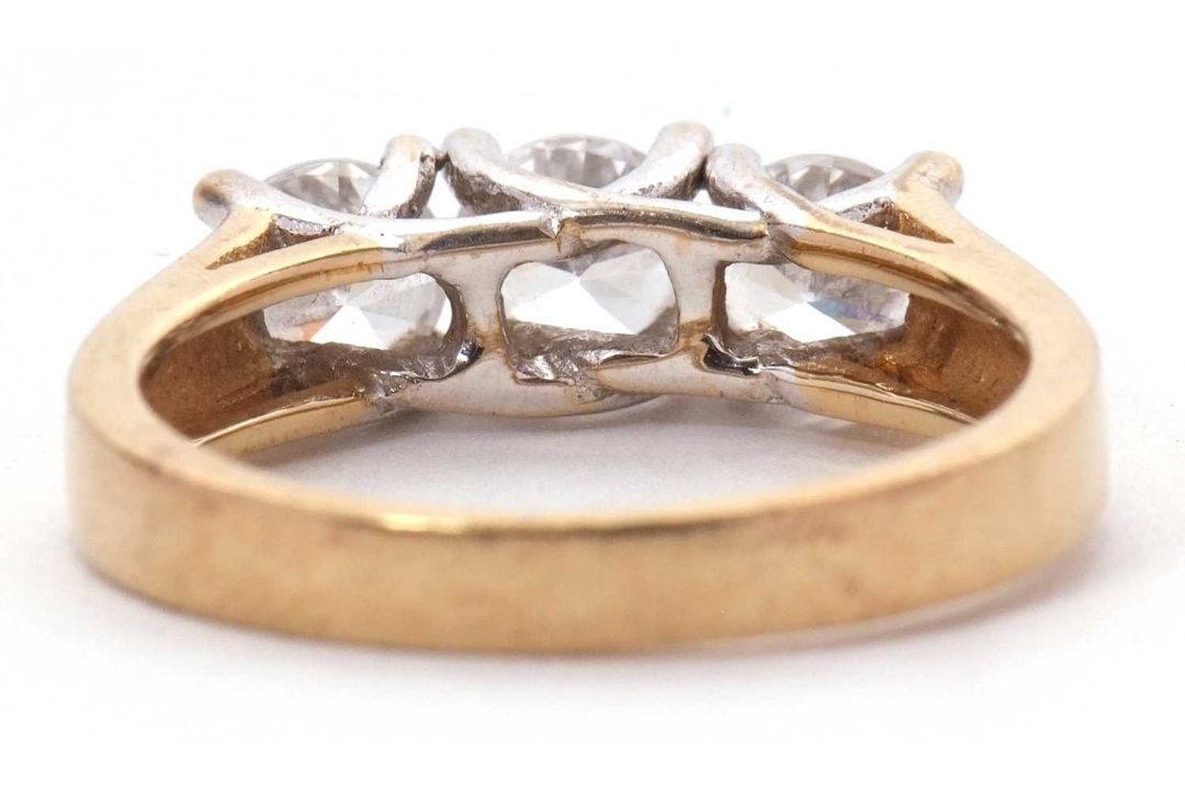 A 9ct CZ ring, the three round CZ's with tapering shoulders and plain band stamped 375 with - Image 2 of 8