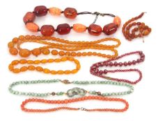 A mixed lot of jewellery: to include an oval amber bead necklace (a/f), 13g; a graduated coral