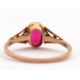 A synthetic ruby ring, the oval synthetic ruby with tapered shoulders and plain band stamped 9ct, - Image 6 of 8