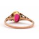 A synthetic ruby ring, the oval synthetic ruby with tapered shoulders and plain band stamped 9ct, - Image 3 of 8