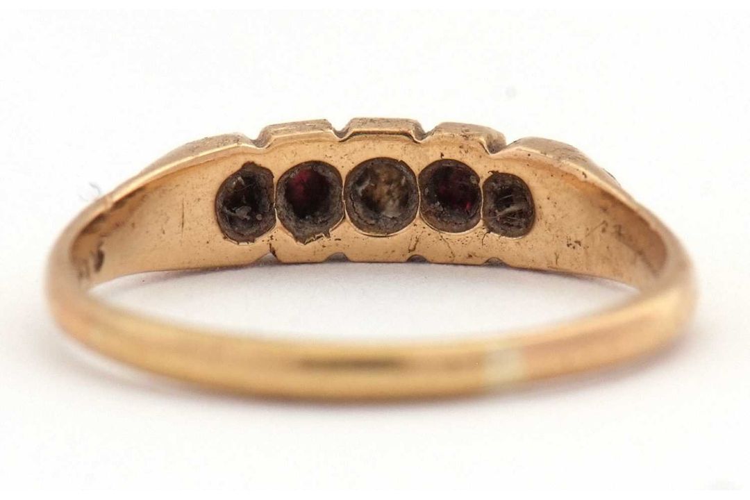 A ruby and diamond ring, set with old mine cut diamonds and mixed cut rubies, with plain band of - Image 5 of 7