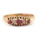 An early 20th century 18ct ruby and diamond ring, the alternating round rubies and old mine cut - Image 1 of 6