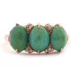 A turquoise and diamond ring, the three oval turquoise cabochons with diamond highlights, all set in