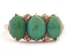 A turquoise and diamond ring, the three oval turquoise cabochons with diamond highlights, all set in