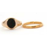 A 22ct wedding band and a 9ct ring: the wedding band hallmarked London 1949, size H-I, 2.1g; and a
