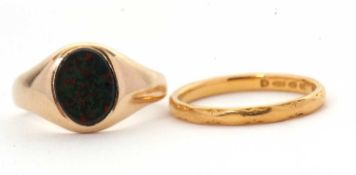 A 22ct wedding band and a 9ct ring: the wedding band hallmarked London 1949, size H-I, 2.1g; and a
