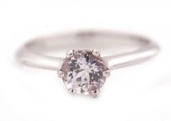 A 9ct kunzite ring, the round single stone kunzite with plain band hallmarked Birmingham 2005,