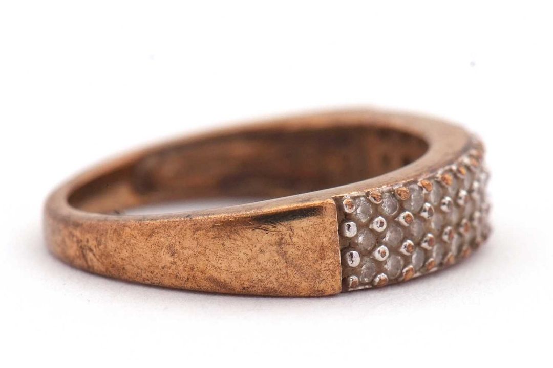A diamond ring, set with three rows of small round brilliant cut diamonds, total estimated approx. - Image 5 of 6