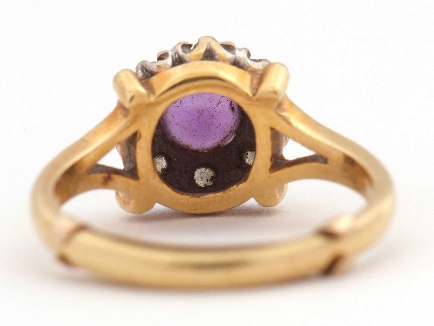 An 18ct amethyst and diamond ring, the central round amethyst surrounded by single cut diamonds, - Image 5 of 7