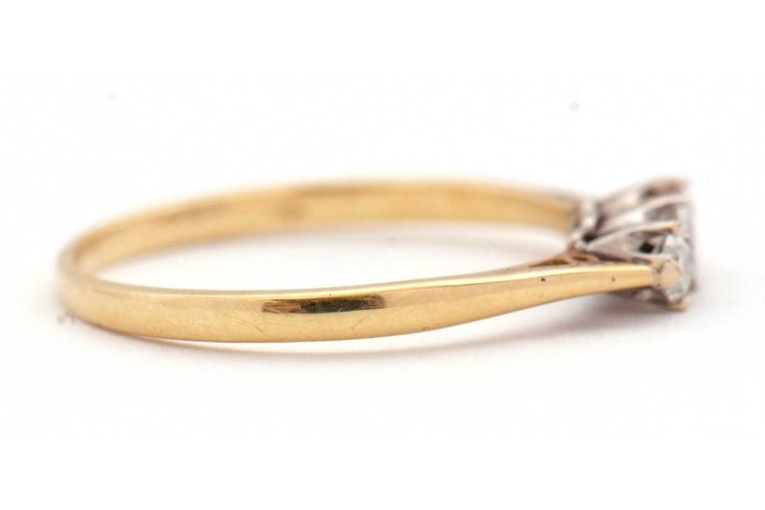 An 18ct three stone diamond ring, the three round brilliant cut diamonds, total estimated approx. - Image 3 of 7