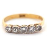 An 18ct five stone diamond ring, the five slightly graduated old European cut diamonds, in