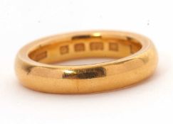 A 22ct gold wedding band, hallmarked London 1929, size K, 8.9g