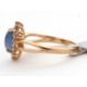 A 9ct sapphire and white zircon ring, the central oval sapphire cabochone, surrounded by small round - Image 5 of 6