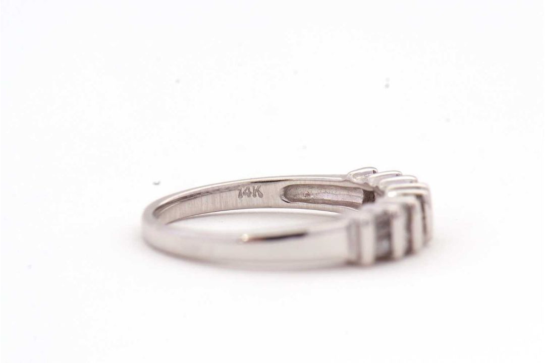 A 14K diamond ring, alternatively set with two baguette and two round brilliant cut diamonds, - Image 6 of 7