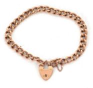 A 9ct curblink bracelet, with each link stamped 9ct, with padlock clasp stamped 9.375, 20cm long,