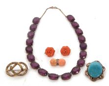 A mixed lot of jewellery: to include a pair of carved coral earrings; a coral and faux pearl brooch;