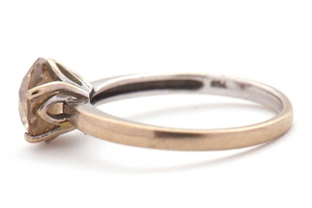 An 18ct champagne diamond solitaire ring, the round brilliant cut diamond, estimated approx. 1. - Image 3 of 9