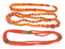 Three bead necklaces: to include a butterscotch amber bead necklace, beads between 6.5 - 15mm
